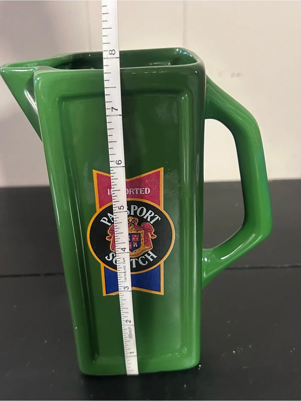 Passport Green Ceramic Pitcher with Multicolor Label